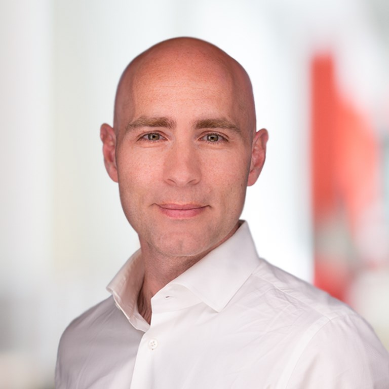 Headshot of Tom Rowland