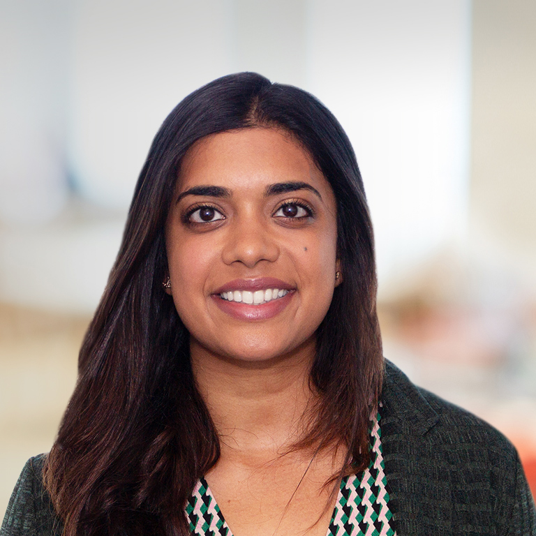 Headshot of Romina Nair