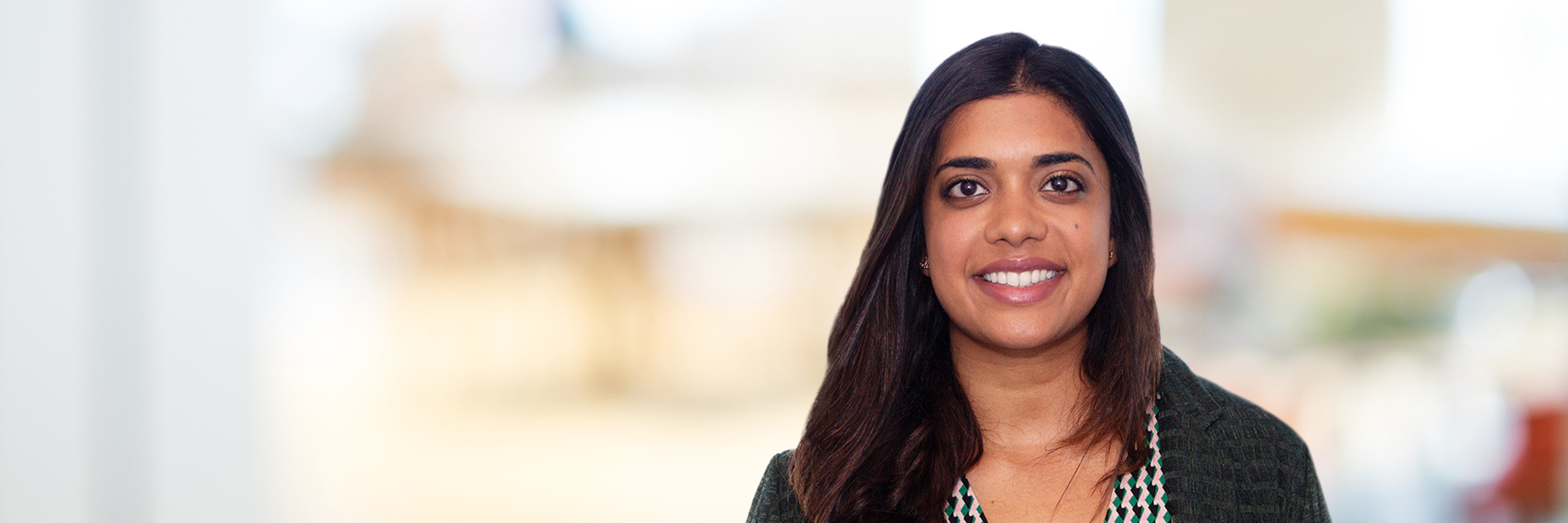 Headshot of Romina Nair