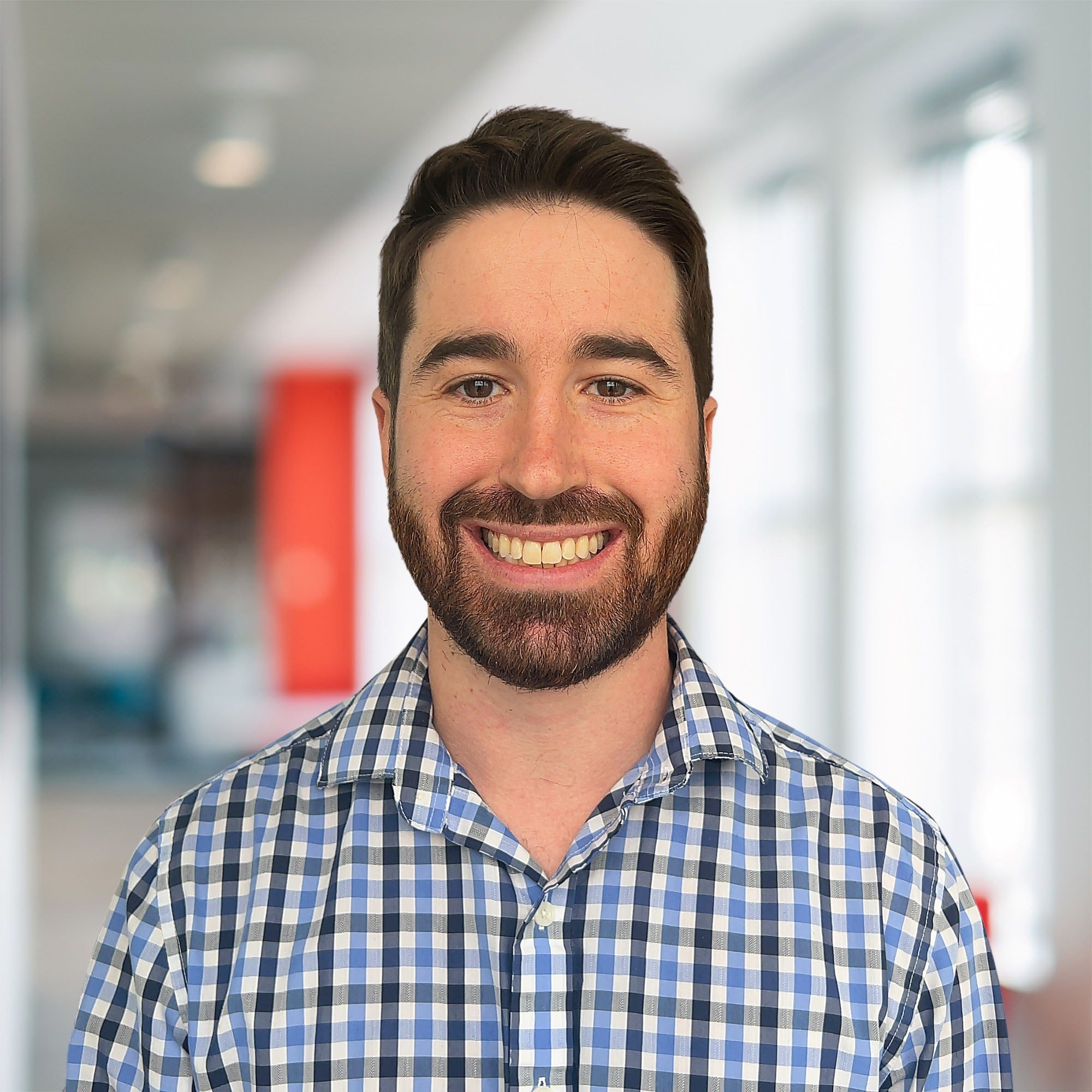 Headshot of Adam Kunkel