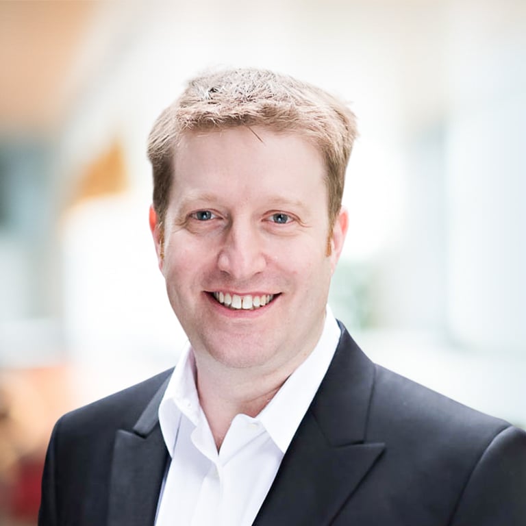 Headshot of Aaron Cheris