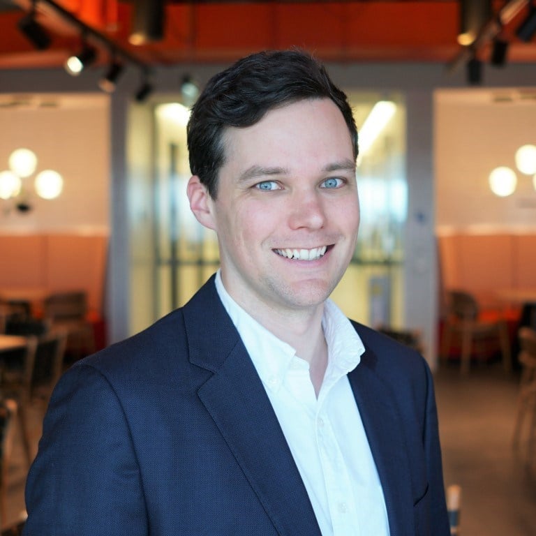 Headshot of Benjamin Hughes