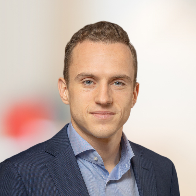 Headshot of Anton Denisov