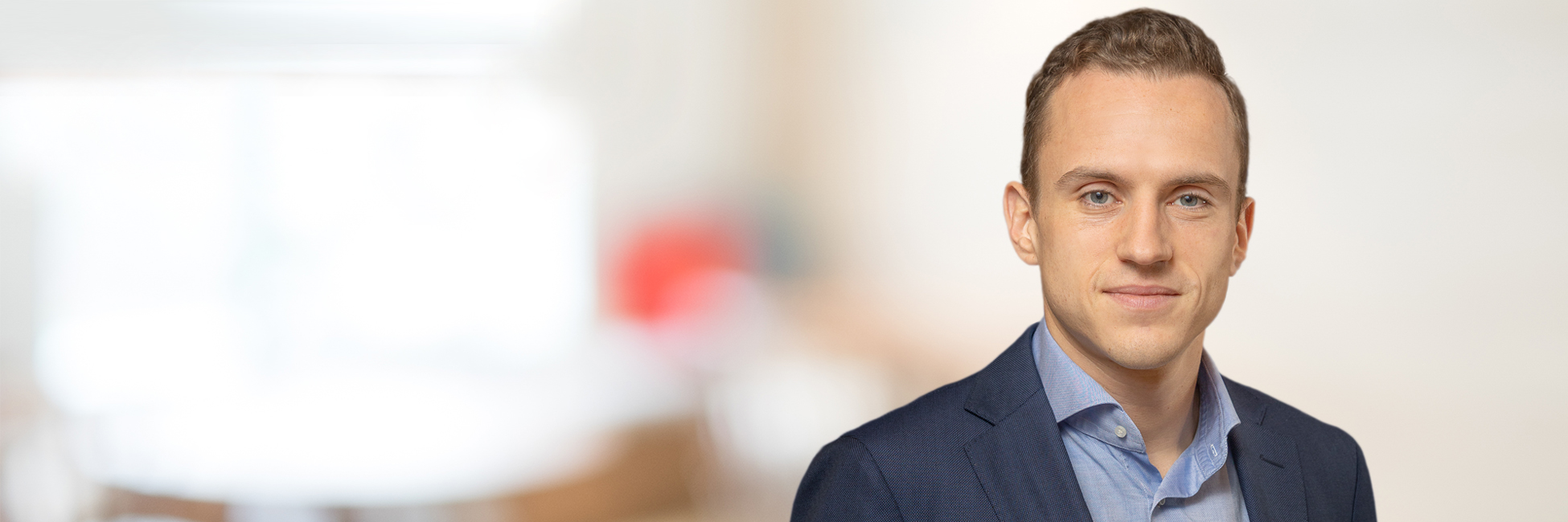 Headshot of Anton Denisov