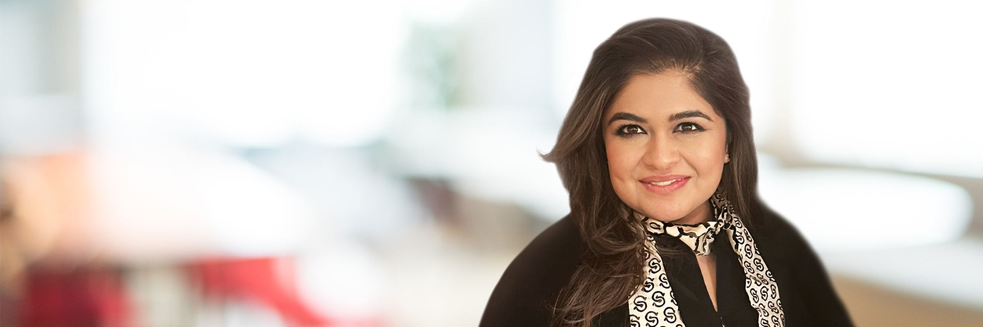 Headshot of Nishma Gosrani