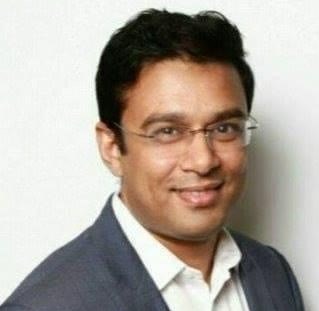 Headshot of Debajyoti Roy