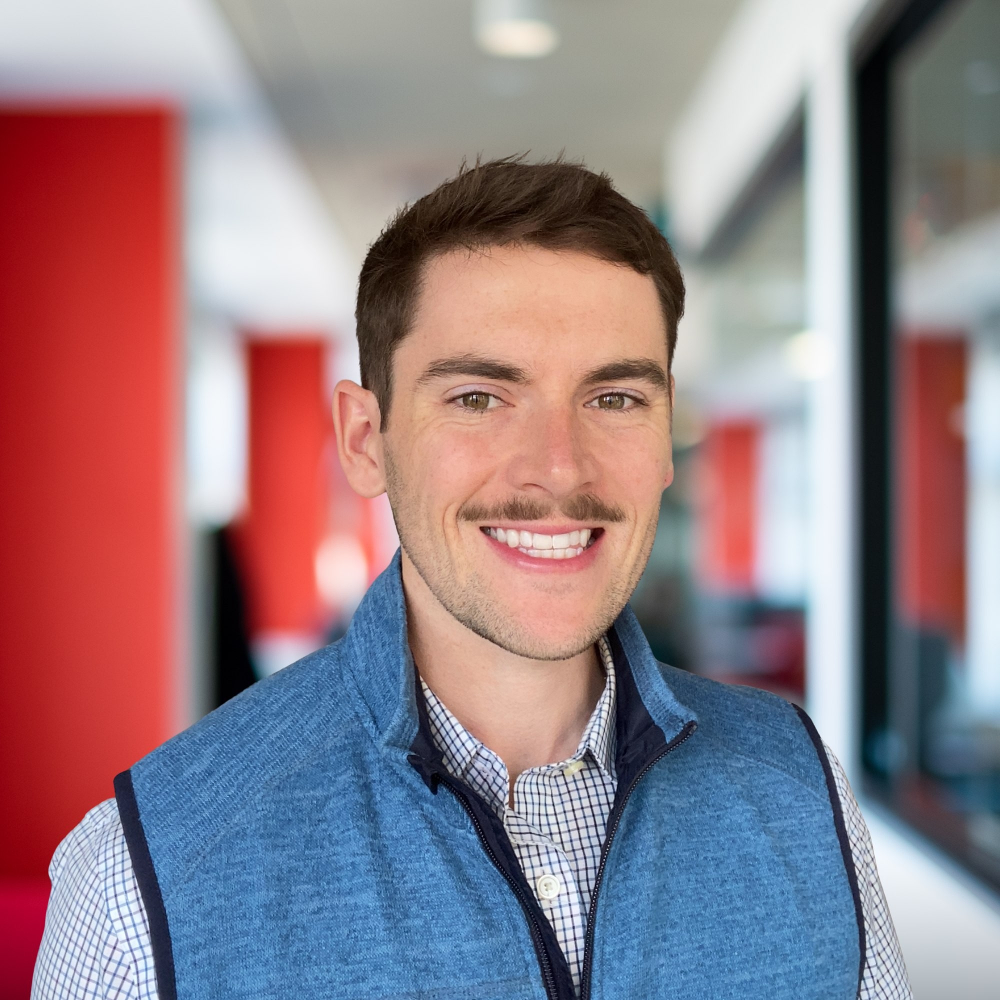 Headshot of Tommy Szymanski