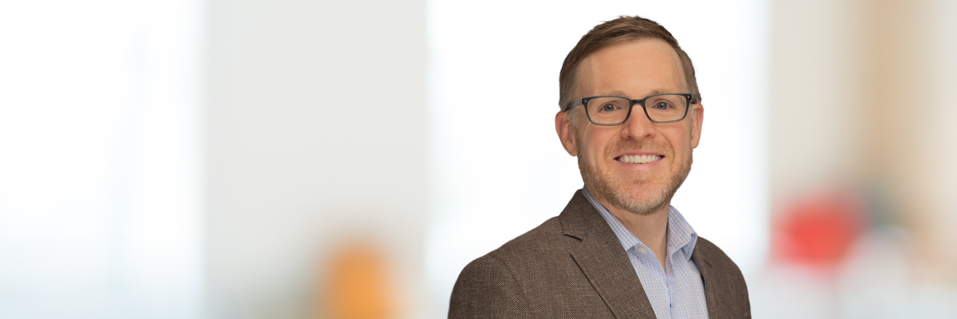 Headshot of Adam Cox