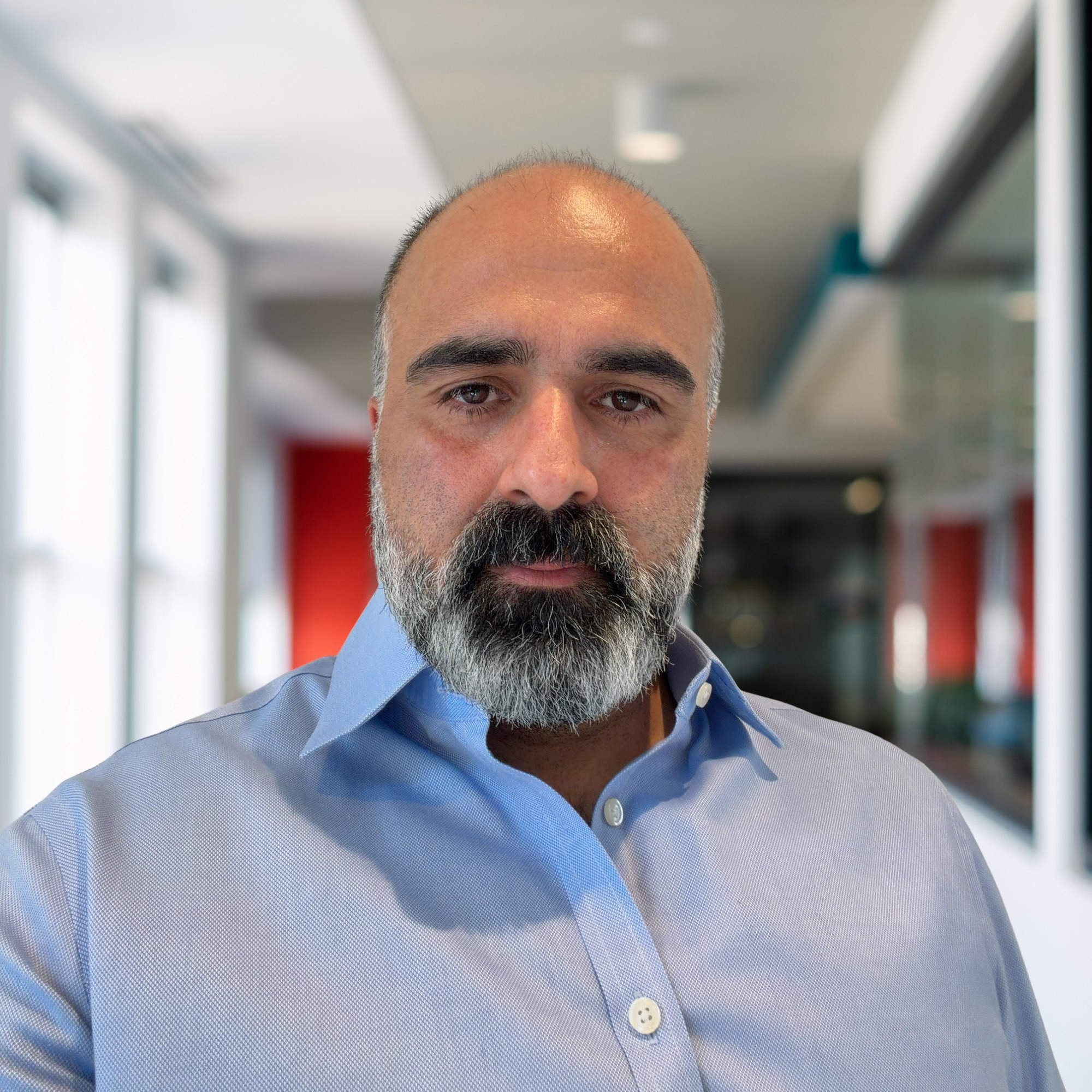 Headshot of Reza Khorshid