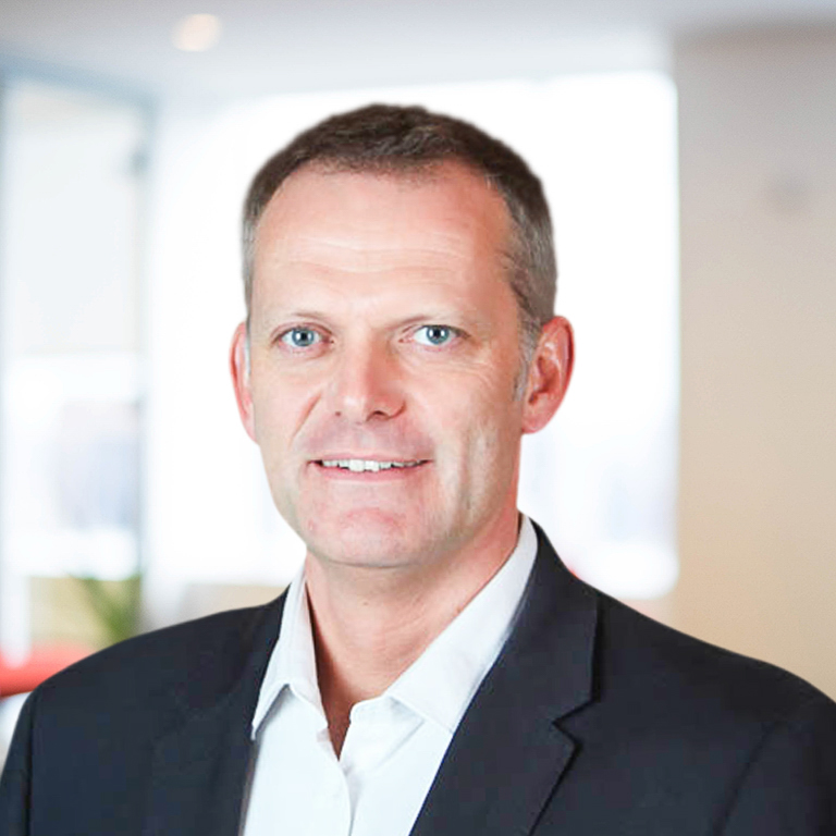 Headshot of Simon Henderson