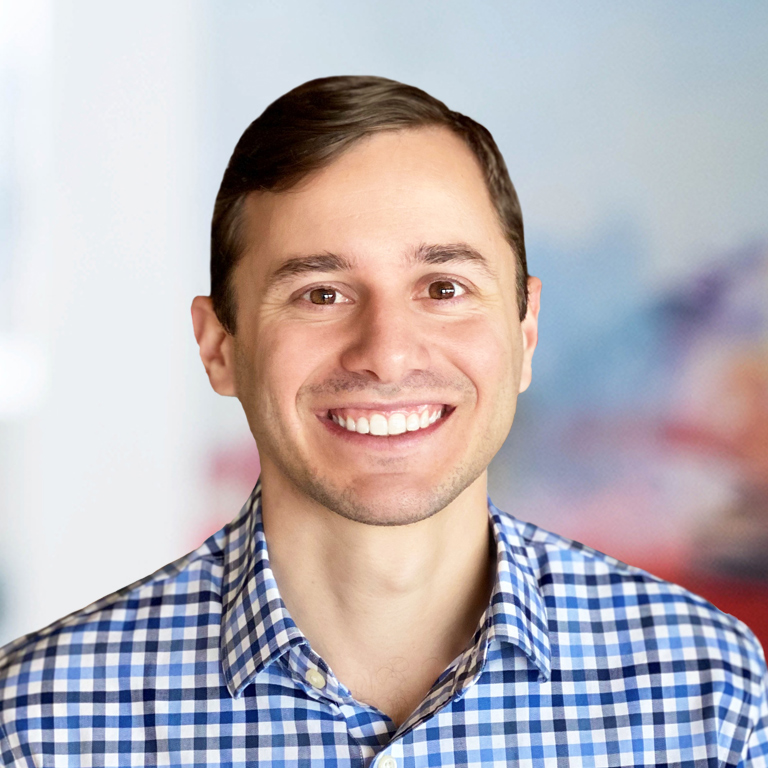 Headshot of Alex Benjamin