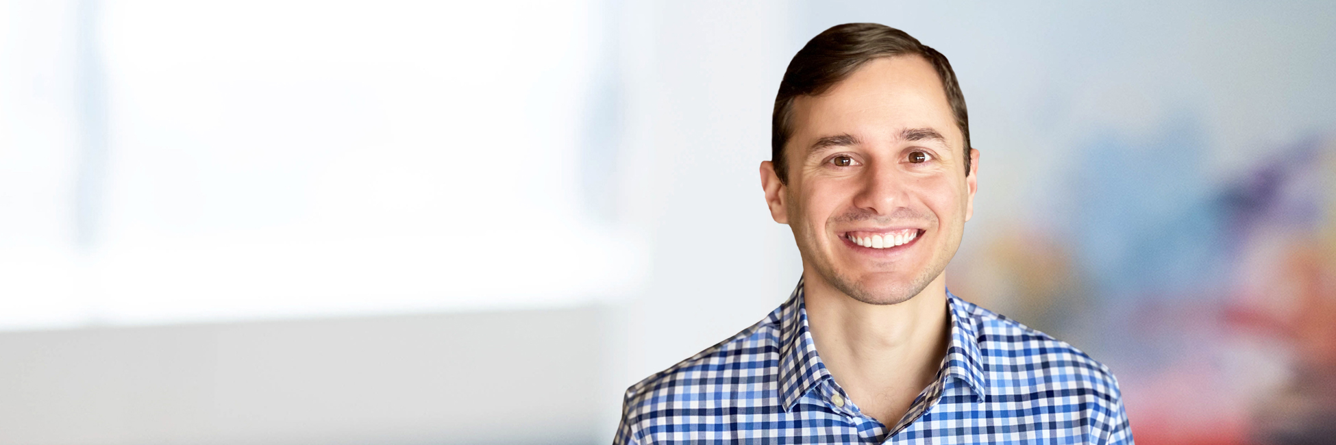 Headshot of Alex Benjamin