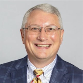 Headshot of Lynn​ Guinn​​