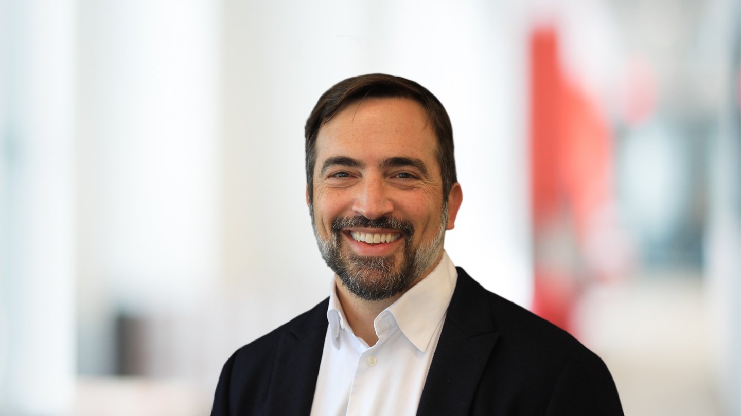 Headshot of Zach First