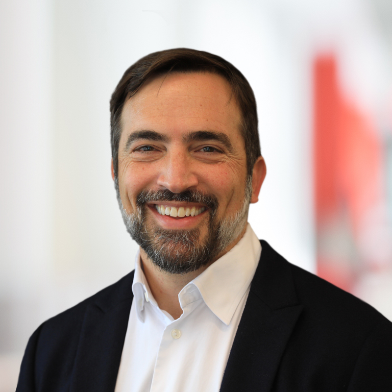 Headshot of Zach First