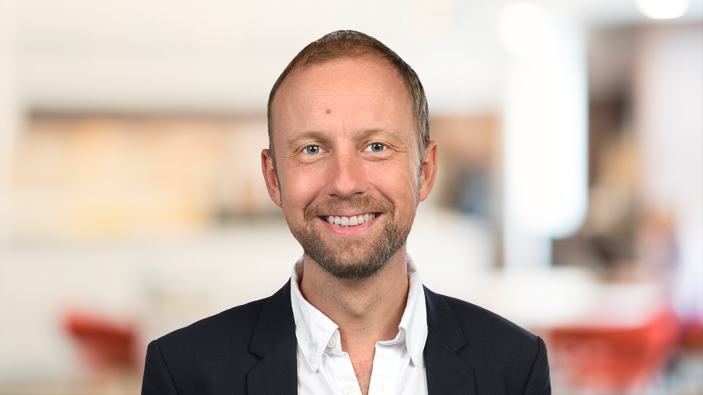 Headshot of Adrian Margus