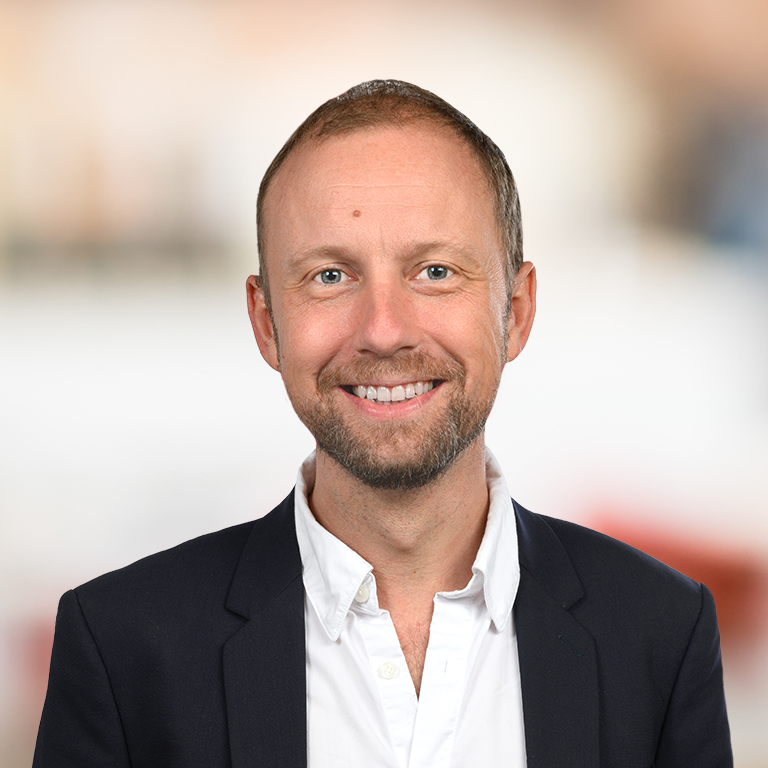 Headshot of Adrian Margus