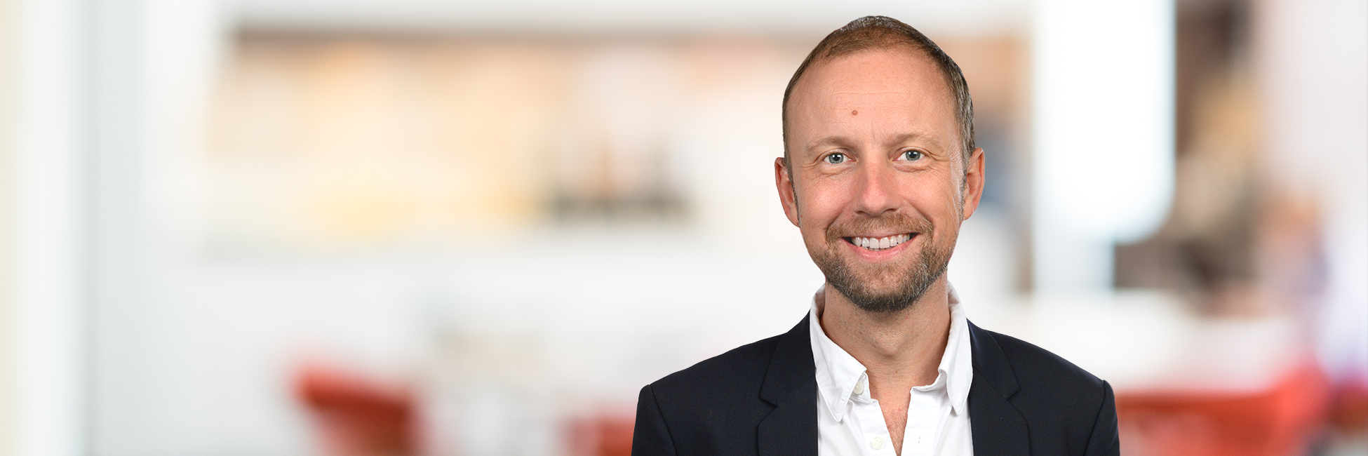 Headshot of Adrian Margus