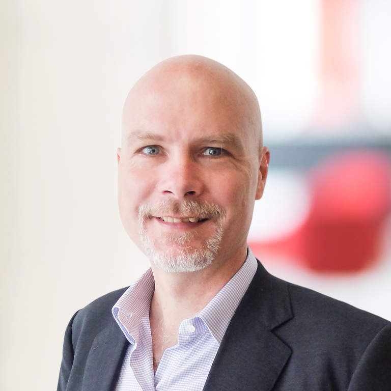 Headshot of Tony May