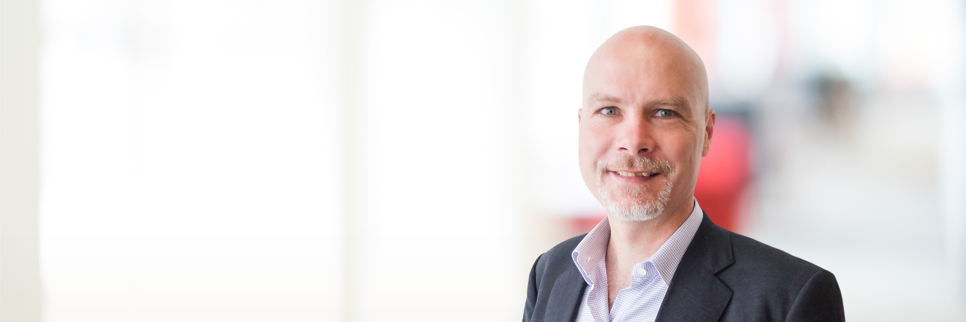 Headshot of Tony May