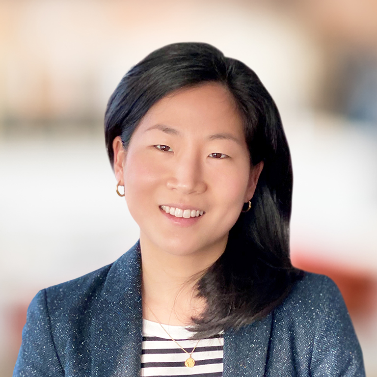 Headshot of Una Kim
