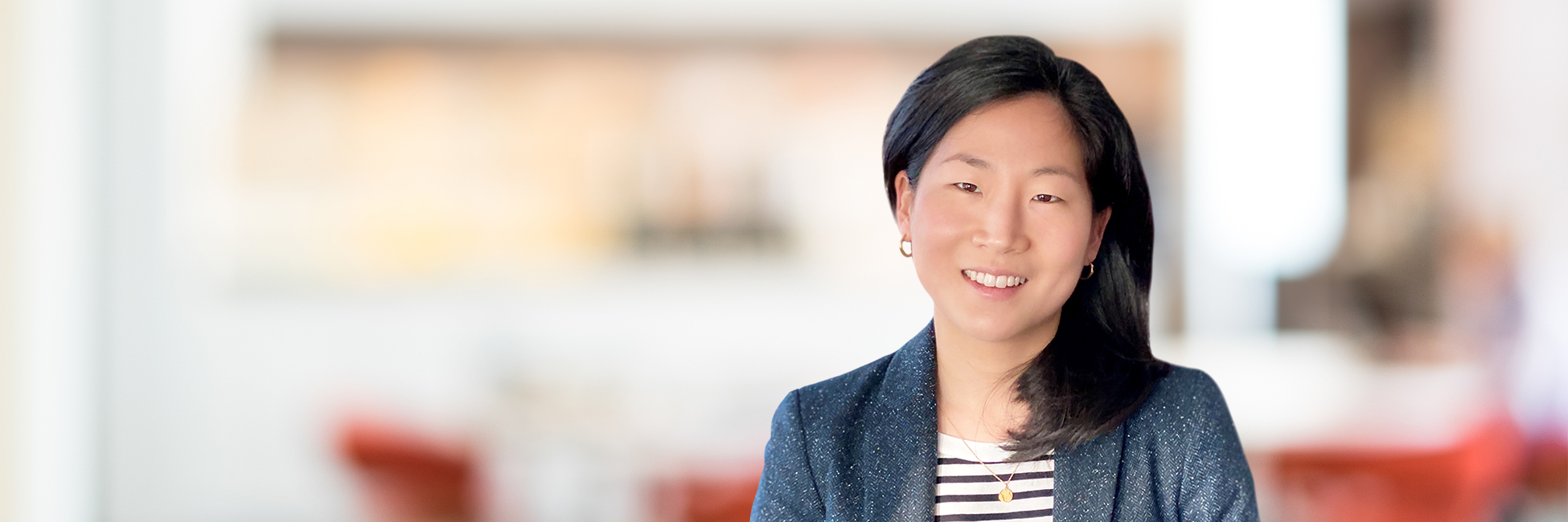 Headshot of Una Kim