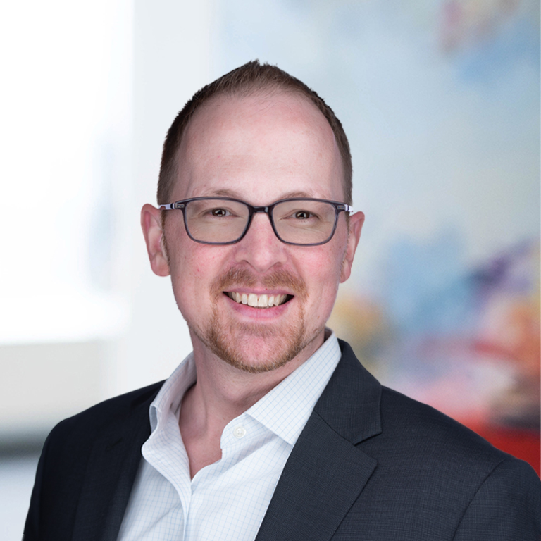 Headshot of Travis Wibracht