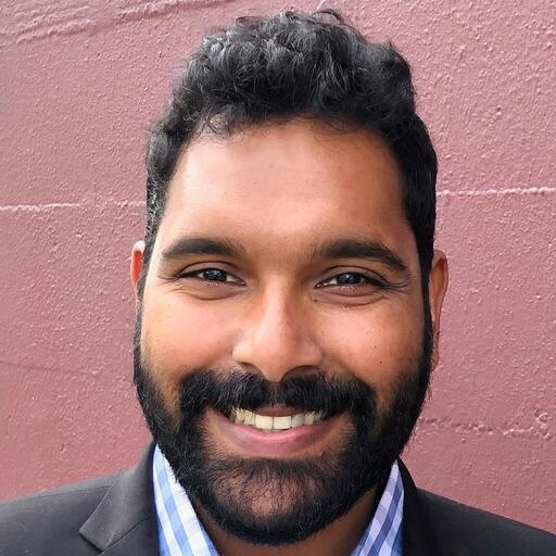 Headshot of Yogi Pillay