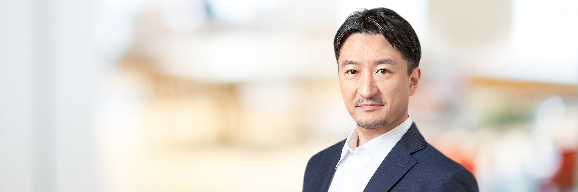 Headshot of Bunsho Kure