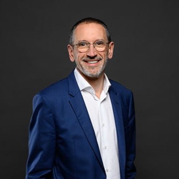 Headshot of Denis  Machuel