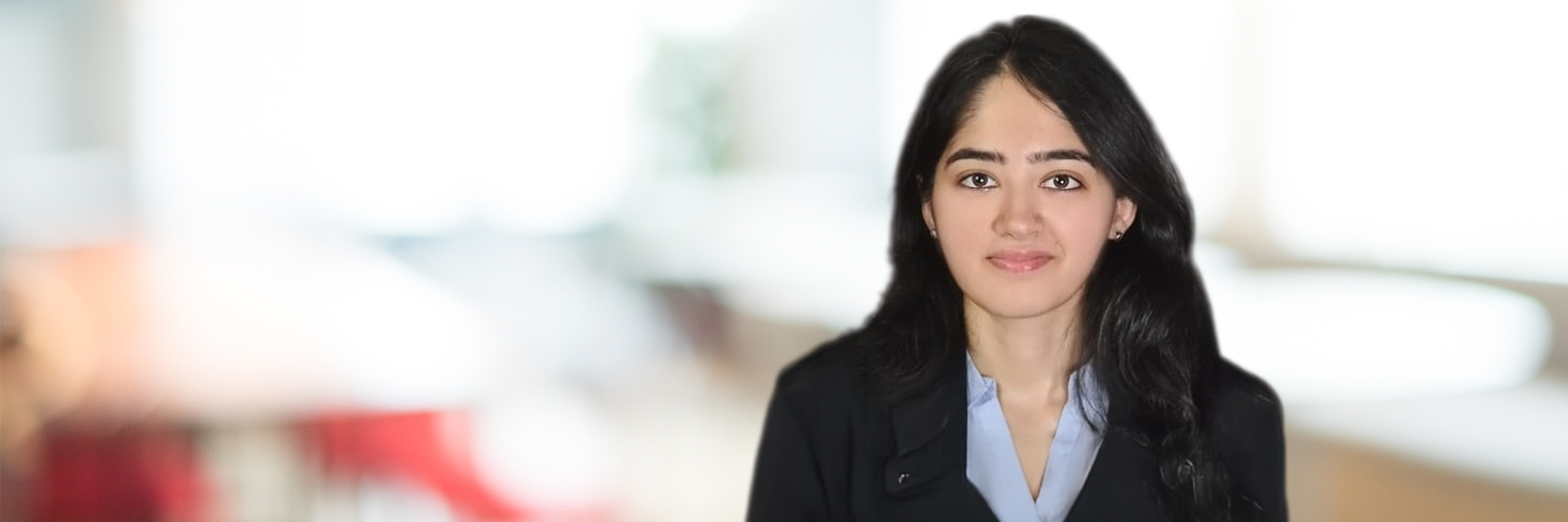 Headshot of Abha Maini