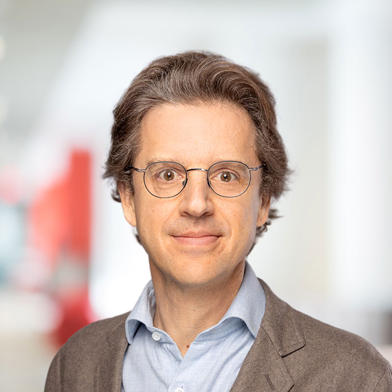 Headshot of Jean-Charles van den Branden