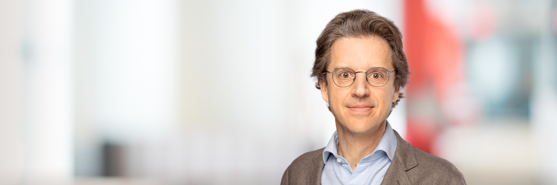 Headshot of Jean-Charles van den Branden