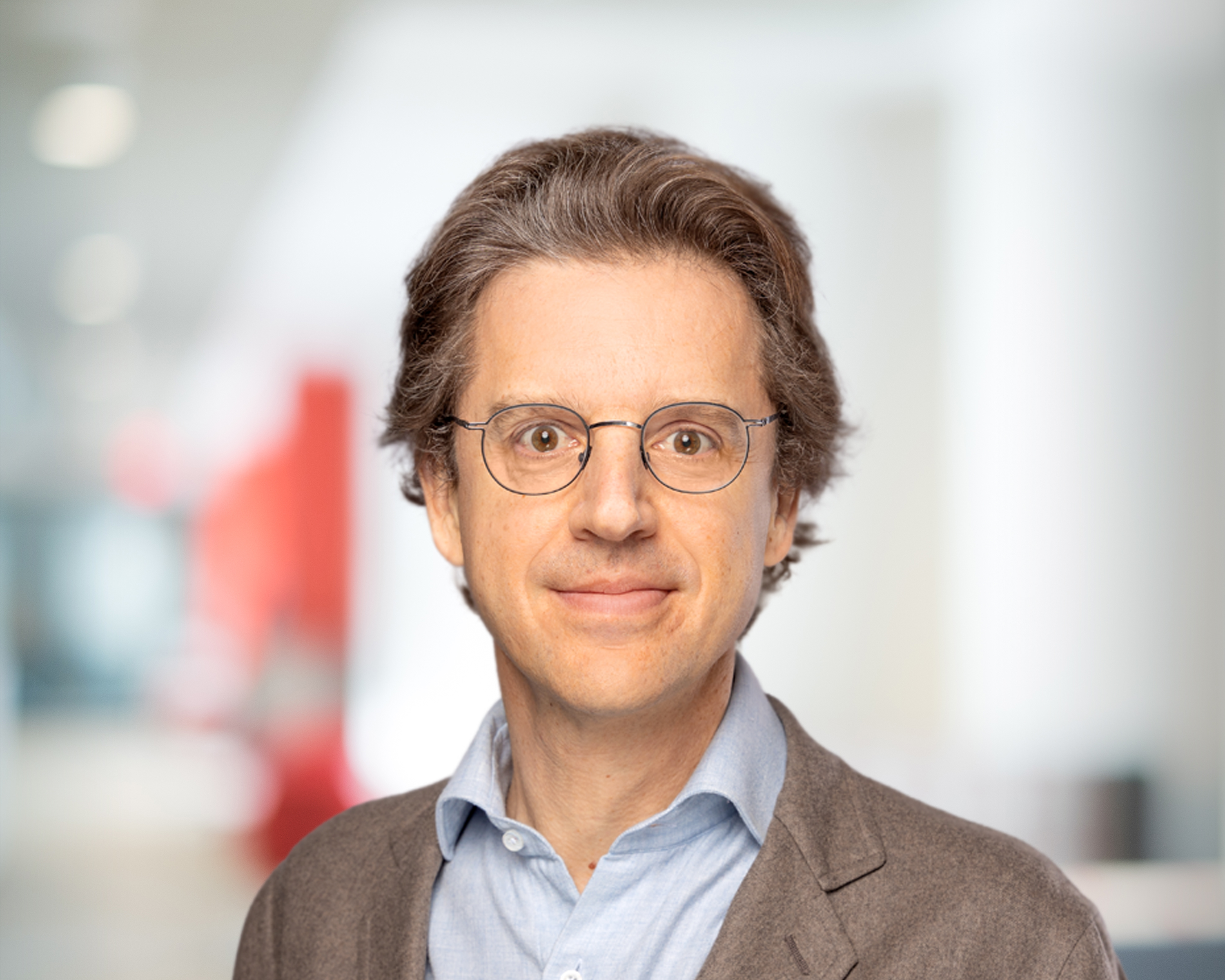 Headshot of Jean-Charles van den Branden