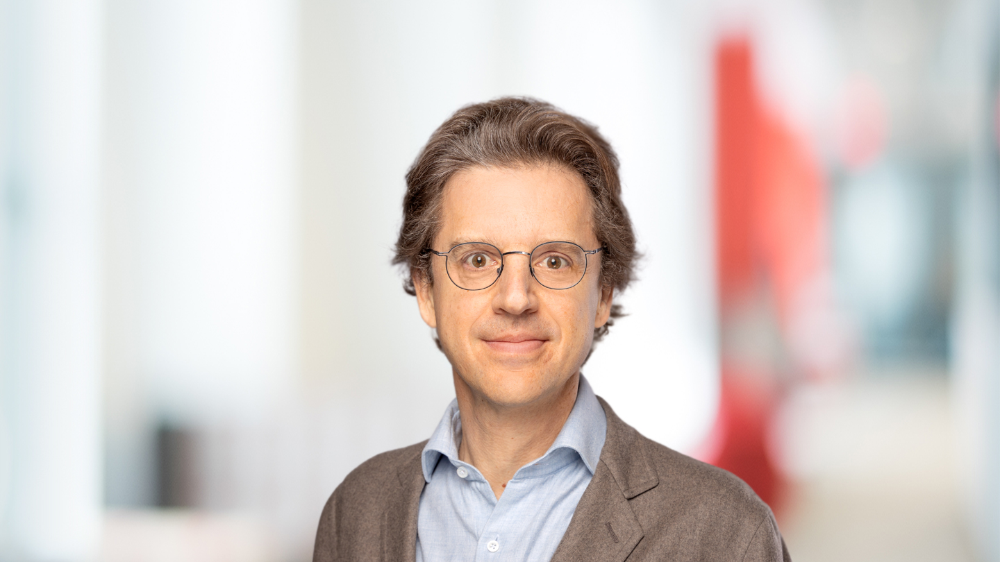 Headshot of Jean-Charles van den Branden